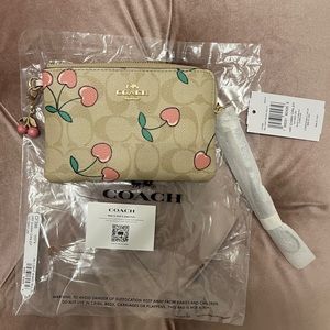 COACH Corner Zip Wristlet in Heart Cherry Print